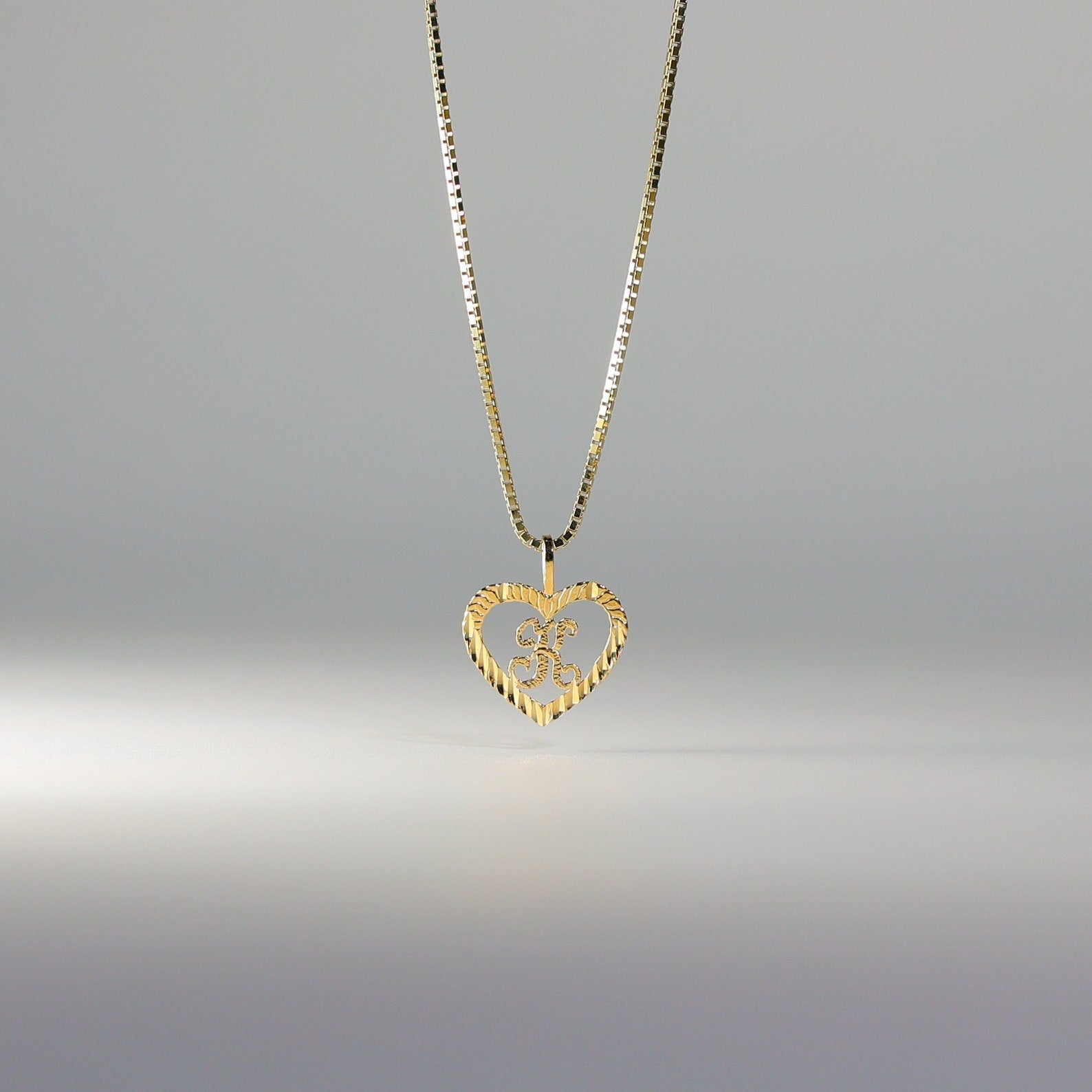 Gold Heart-Shaped Letter K Pendant | A-Z Pendants - Charlie & Co. Jewelry