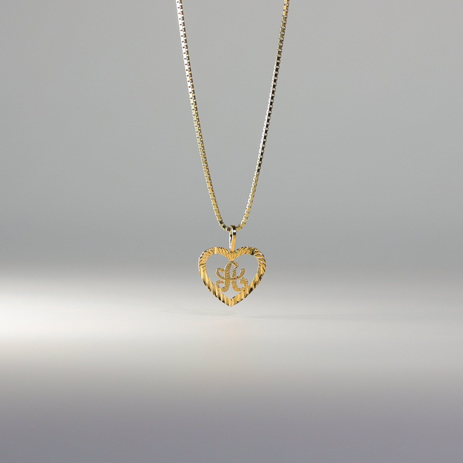 Gold Heart-Shaped Letter A Pendant | A-Z Pendants - Charlie & Co. Jewelry