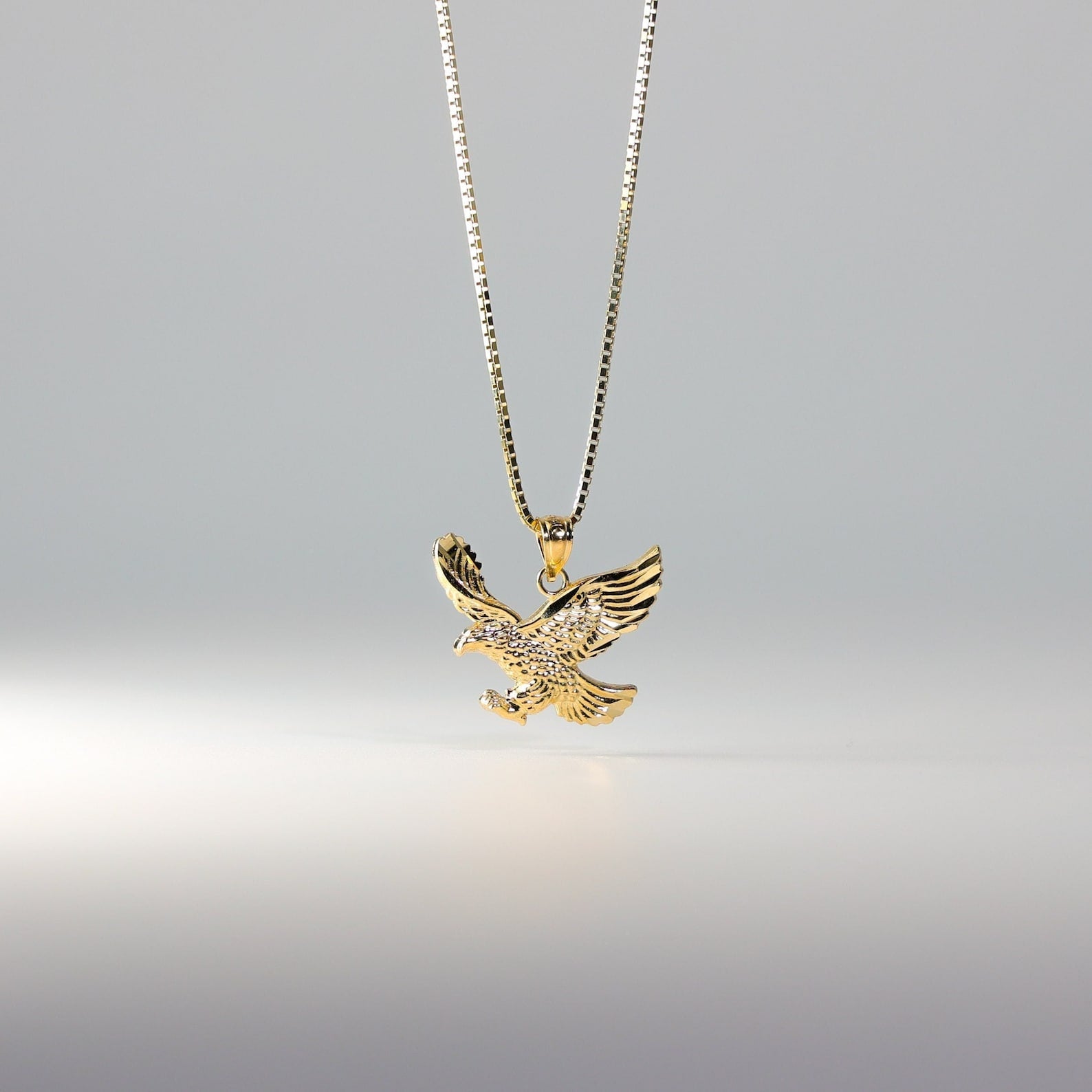 Gold Flying Eagle Pendant Model-1596 - Charlie & Co. Jewelry