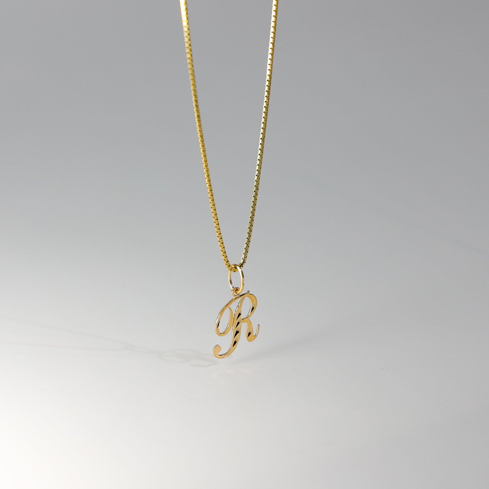 Gold Calligraphy Letter R Pendant | A-Z Pendants - Charlie & Co. Jewelry