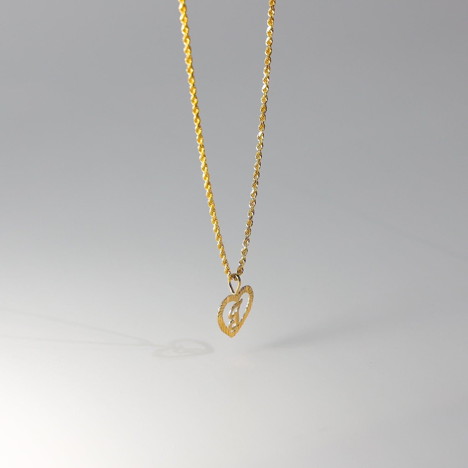 Gold Heart-Shaped Letter T Pendant | A-Z Pendants - Charlie & Co. Jewelry