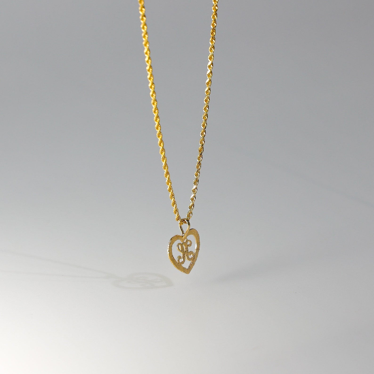 Gold Heart-Shaped Letter K Pendant | A-Z Pendants - Charlie & Co. Jewelry