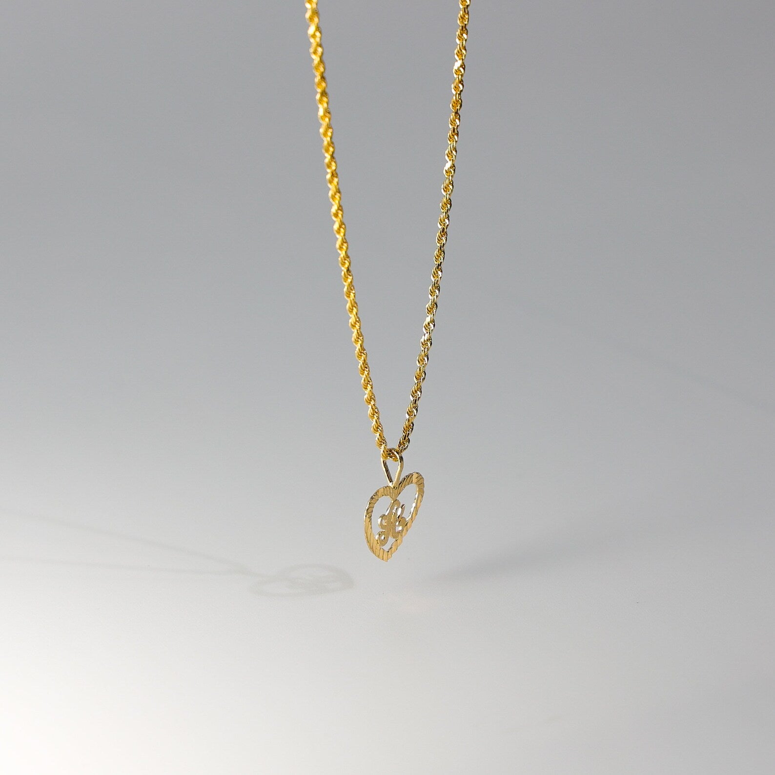 Gold Heart-Shaped Letter A Pendant | A-Z Pendants - Charlie & Co. Jewelry
