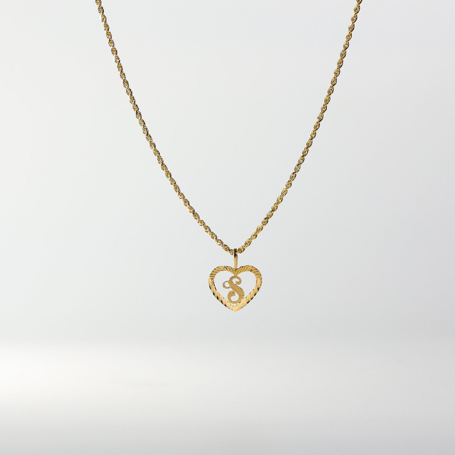 Gold Heart-Shaped Letter S Pendant | A-Z Pendants - Charlie & Co. Jewelry