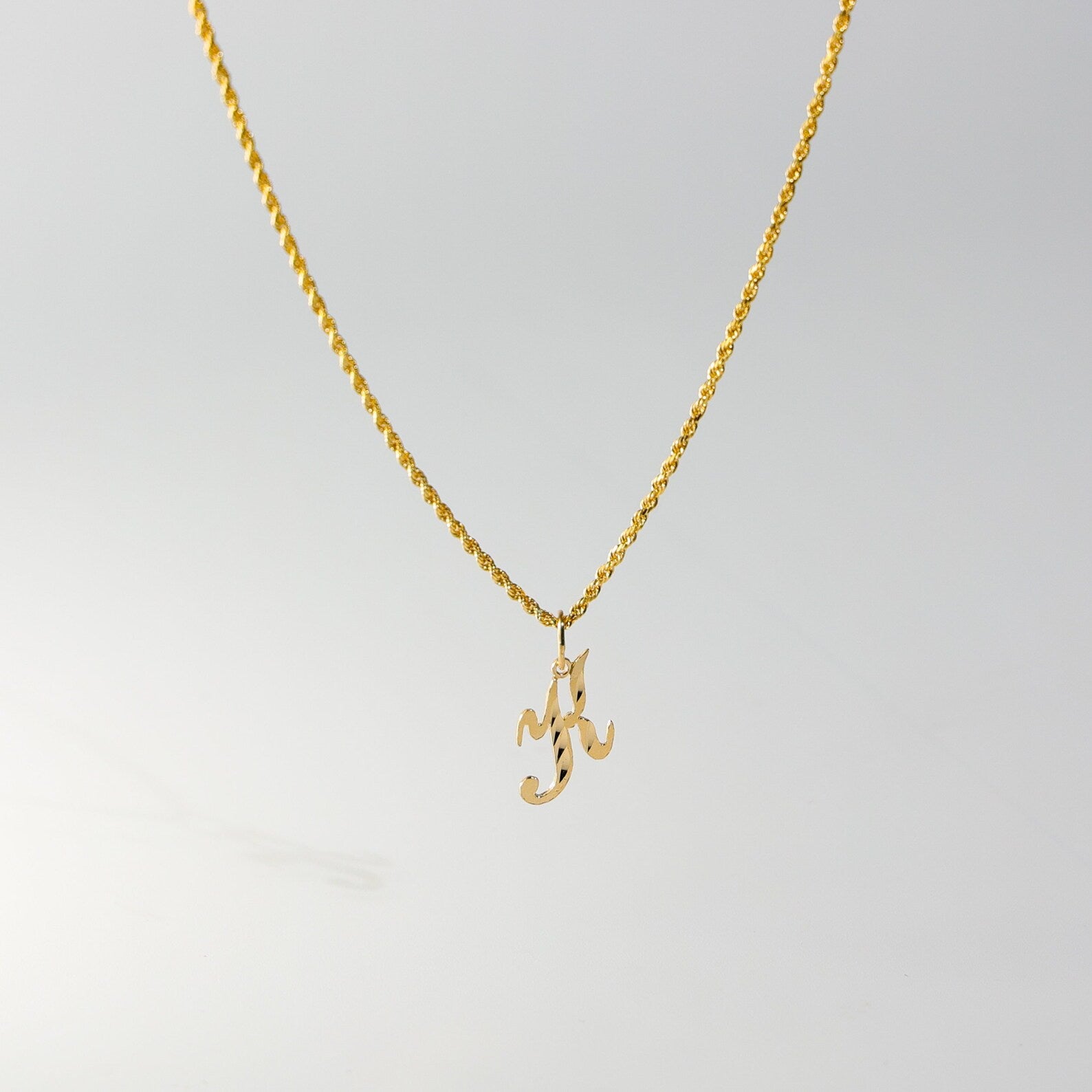 Gold Calligraphy Letter K Pendant | A-Z Pendants - Charlie & Co. Jewelry