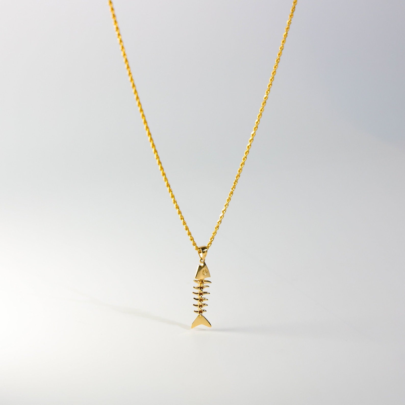 Adorable Motion Fish Bone Gold Pendant - Charlie & Co. Jewelry