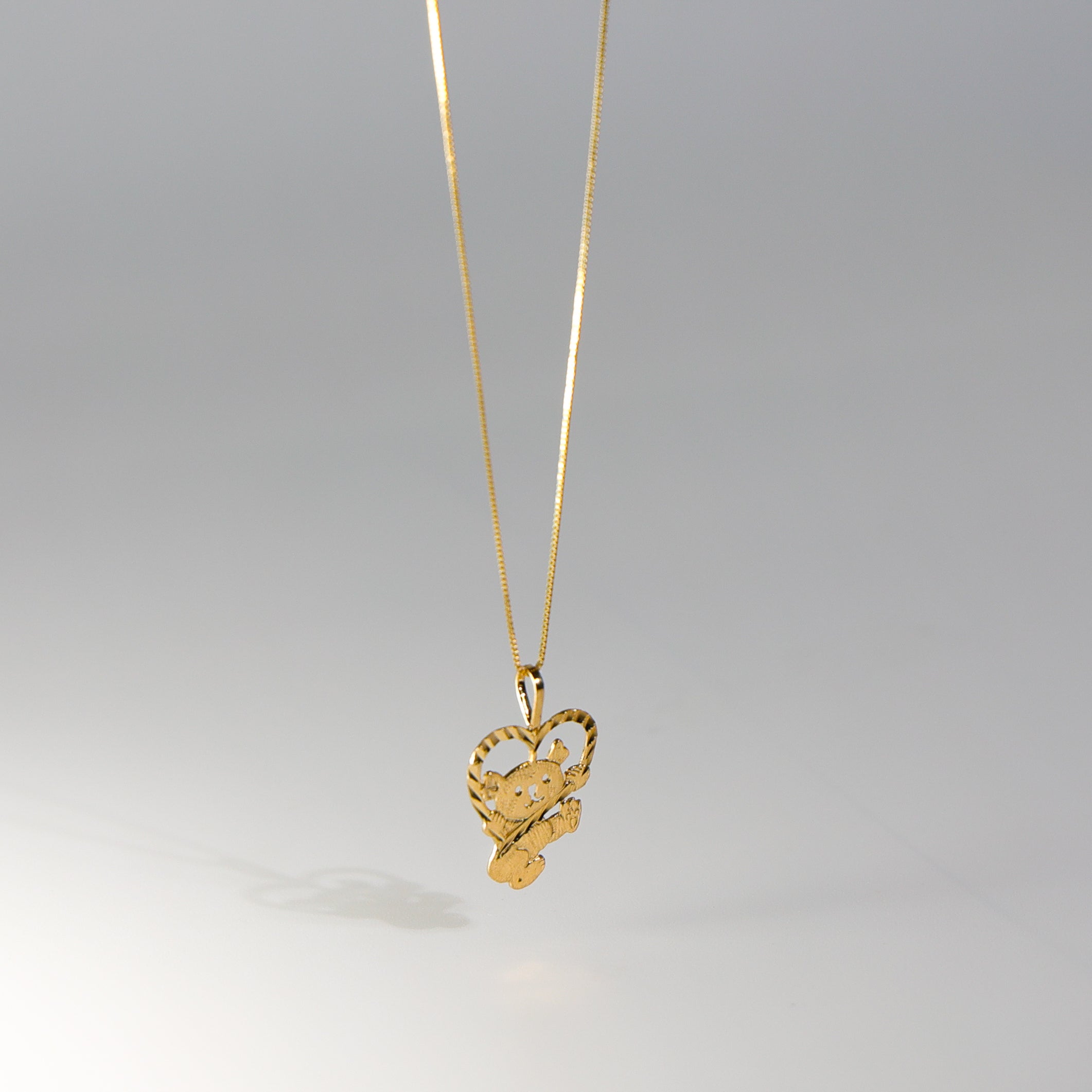 Gold Baby Bear with Heart Pendant Model-1655 - Charlie & Co. Jewelry