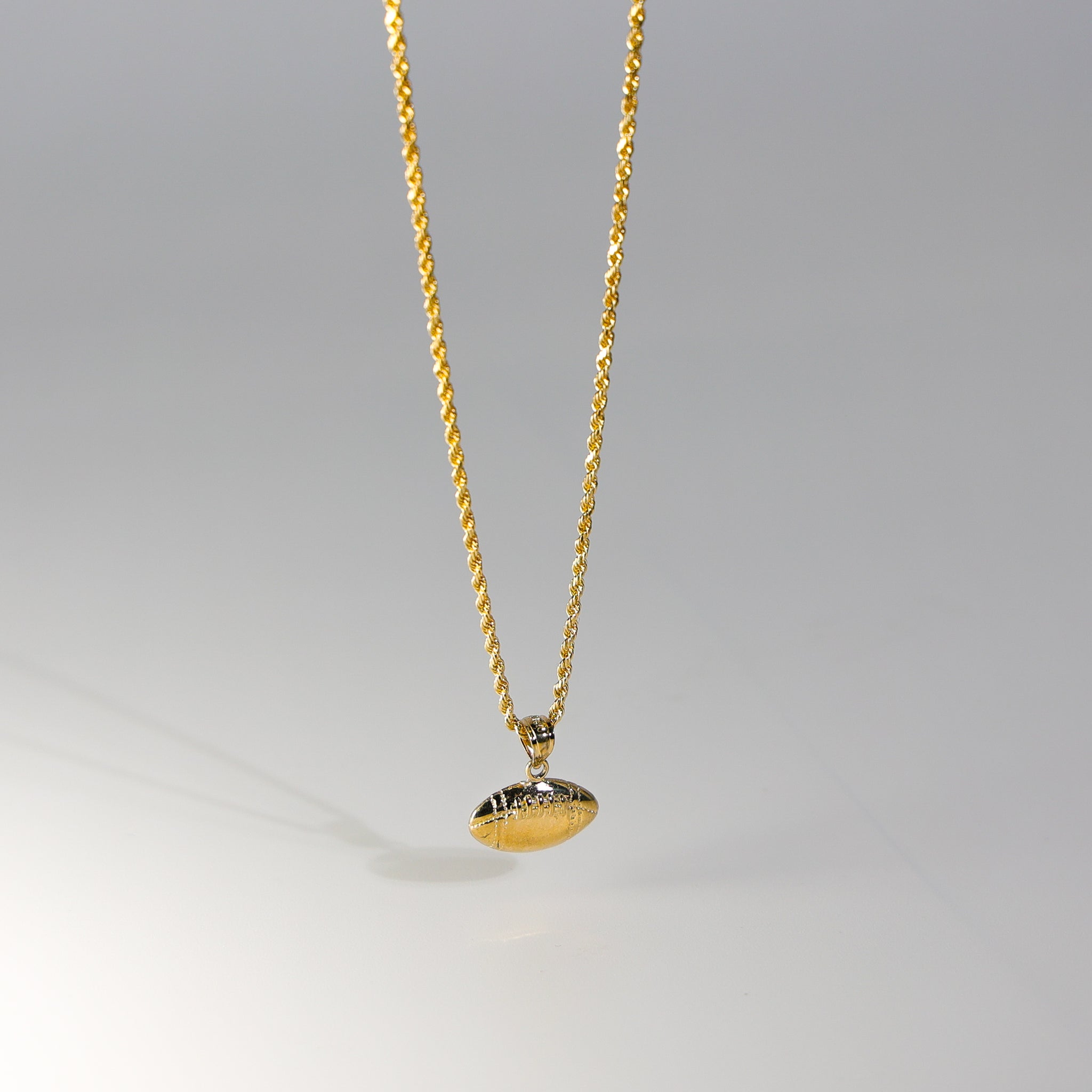 Gold Football Pendant Model-2336 - Charlie & Co. Jewelry
