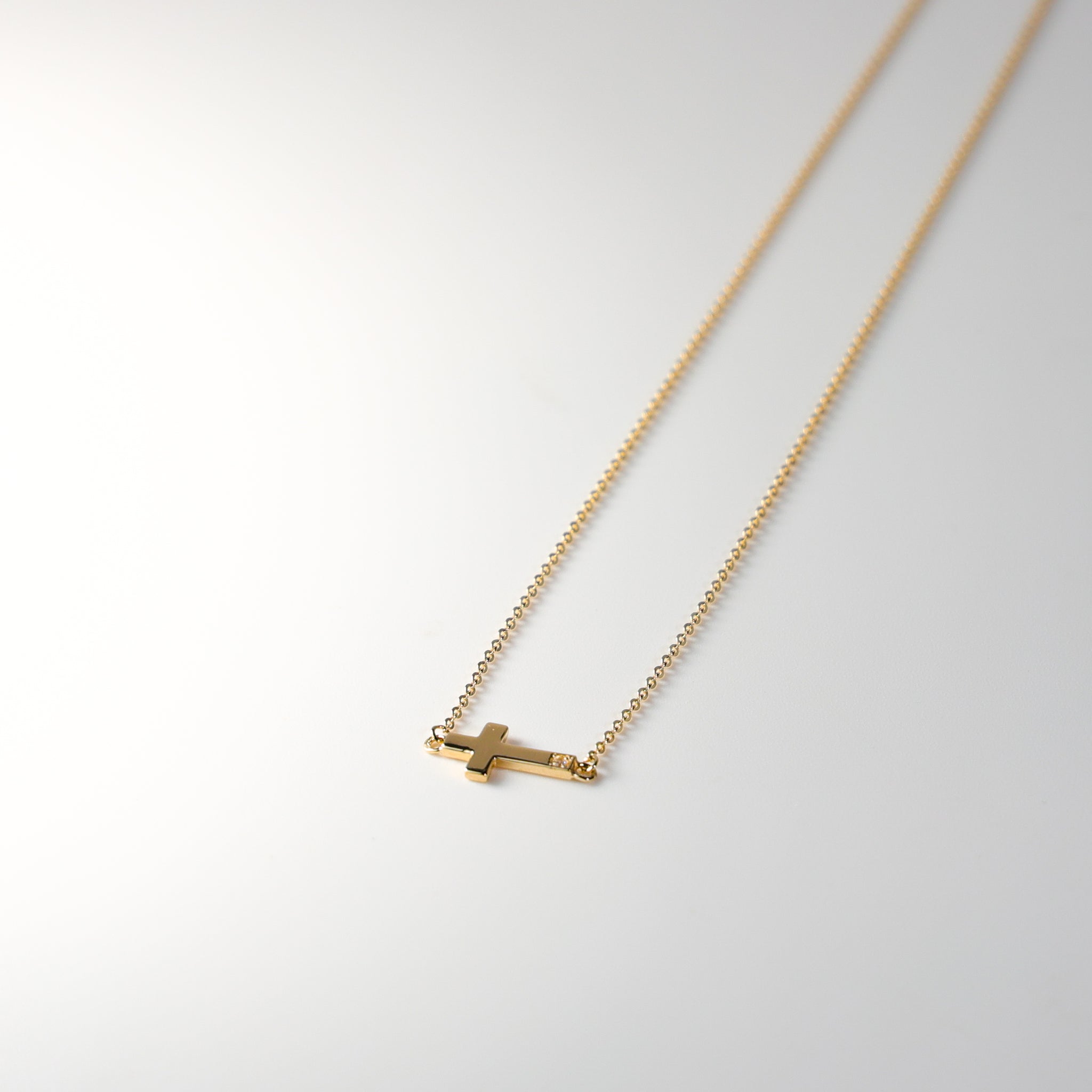 14K Dainty Gold Side Way Cross Necklace Model-NK0209 - Charlie & Co. Jewelry