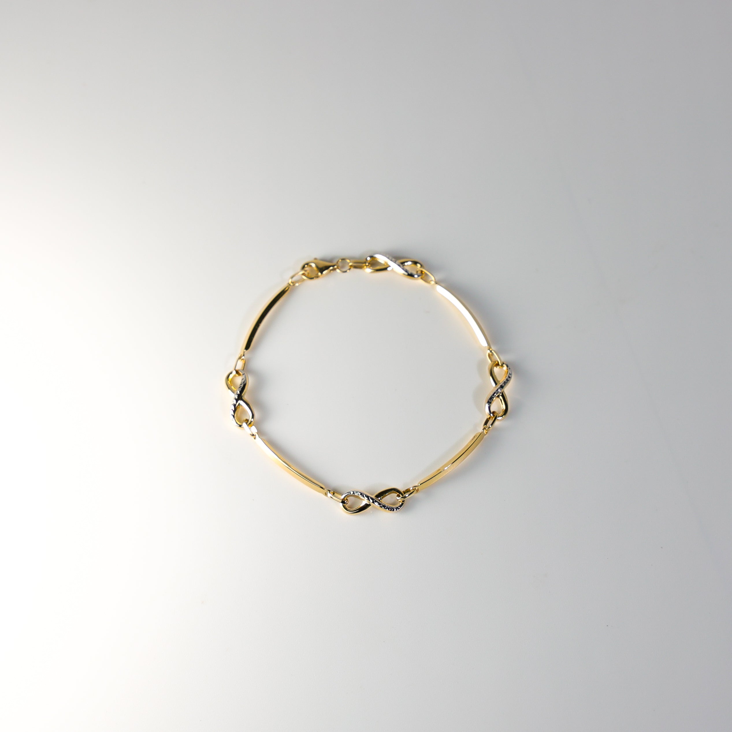 14K Gold Infinity Charms Bracelet Model-AB0684 - Charlie & Co. Jewelry