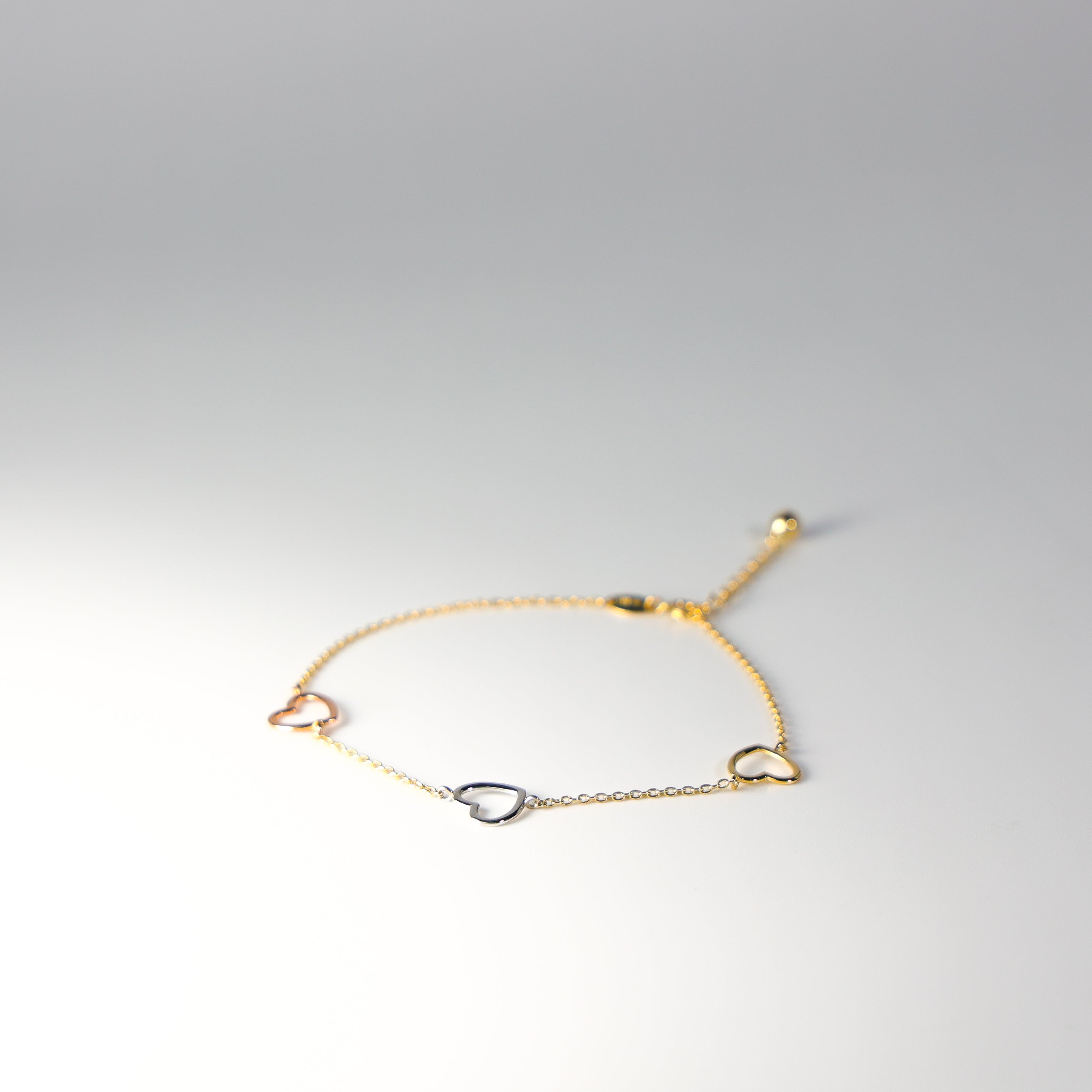 14K Gold Open Hearts Bracelet Model-AB0702 - Charlie & Co. Jewelry