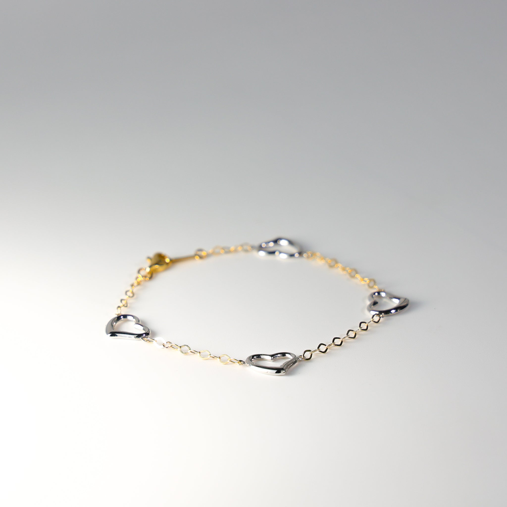 14K Gold Open Hearts Bracelet Model-AB0172 - Charlie & Co. Jewelry